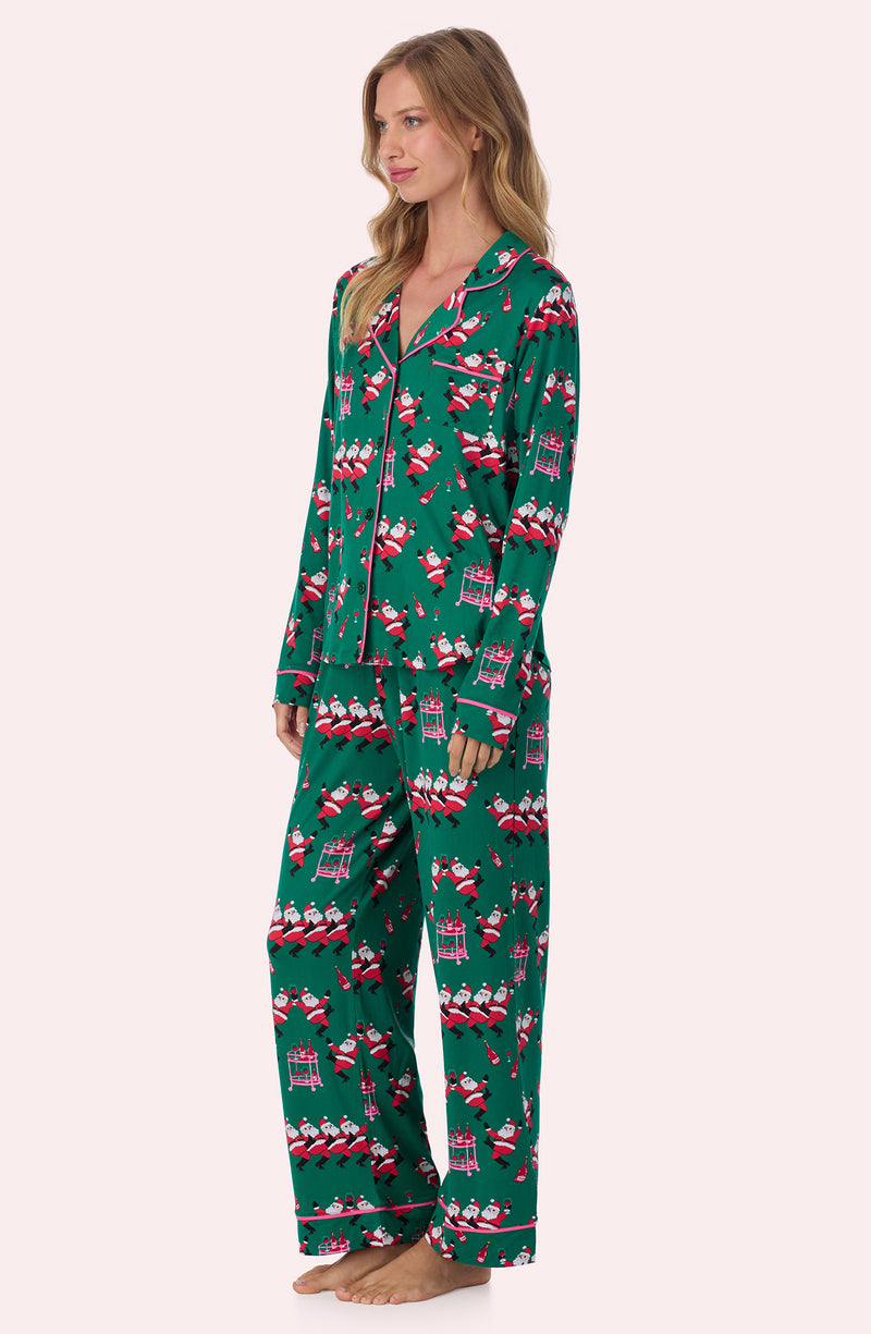A lady wearing Charlotte Knit Pj Set In Jingle Bell Jive
