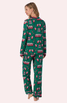 A lady wearing Charlotte Knit Pj Set In Jingle Bell Jive