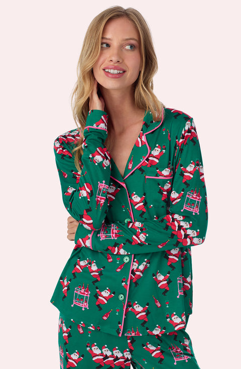 A lady wearing Charlotte Knit Pj Set In Jingle Bell Jive
