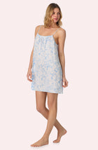 A lady wearing Izzy Woven Chemise In Butterflies & Bows