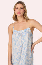 A lady wearing Izzy Woven Chemise In Butterflies & Bows