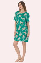 A Lady Wearing Mila Knit Sleepshirt In Safari Spots in a front view standing pose