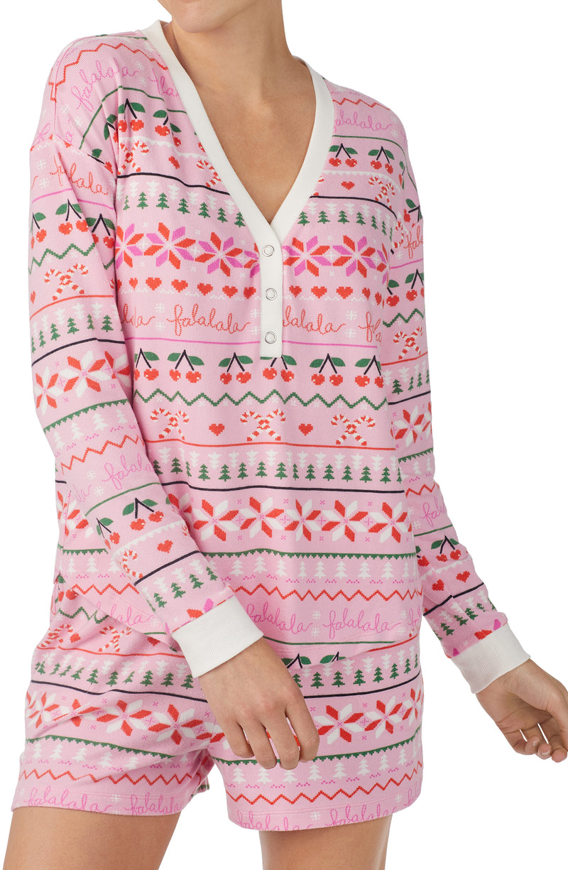 A lady wearing pink Long Sleeve Harper 3 Pc Set with Festive Fling print.