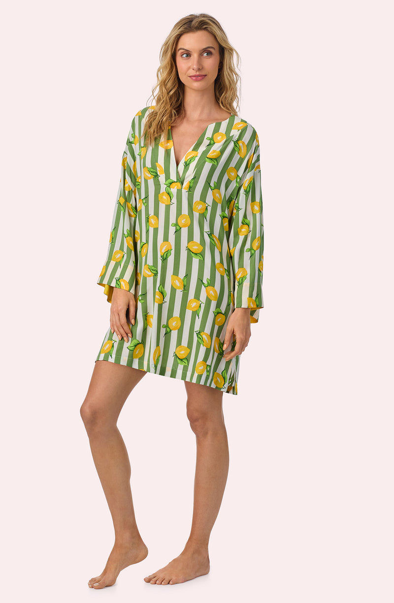 A lady wearing Simone Woven Tunic In Lemonade Stand Stripe
