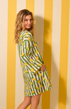A lady wearing Simone Woven Tunic In Lemonade Stand Stripe