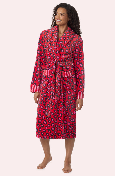 A Lady Wearing Risa Chenille Robe In Wild Spots & Stripes in a front view, side angle pose
