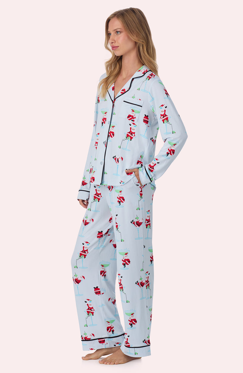A lady wearing Charlotte Knit Pj Set In Ice Blue Sippin' With Santa