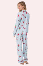 A lady wearing Charlotte Knit Pj Set In Ice Blue Sippin' With Santa