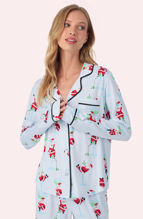 A lady wearing Charlotte Knit Pj Set In Ice Blue Sippin' With Santa