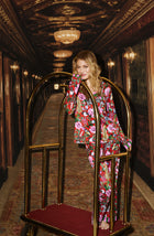 A lady wearing Collette Knit Pj Set In Scarlet Safari