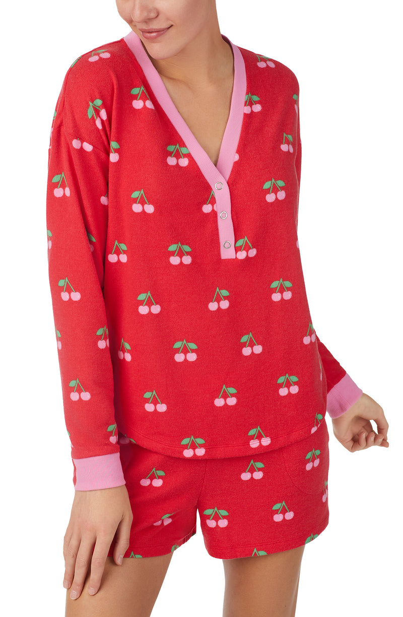 A lady wearing Red Long Sleeve Harper 3 Pc Set with Cherry Crush print.