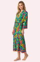 A Lady Wearing Cara Woven Robe In Jungle Breeze Side Angle View