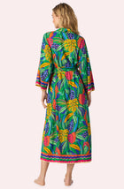 A Lady Wearing Cara Woven Robe In Jungle Breeze Back View
