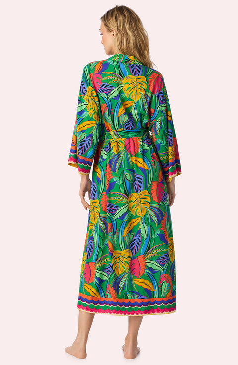 A Lady Wearing Cara Woven Robe In Jungle Breeze Back View