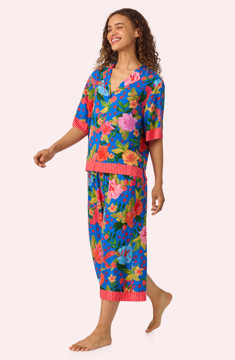 A lady wearing Georgia Cropped Woven Pj Set In Floral Fiesta