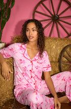 A lady wearing Arizona Long Knit Pj Set In Cowgirl Sweetheart