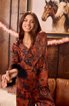 A lady wearing Ariana Woven Pj Set In Jungle Noir