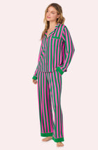 A lady wearing Collette Knit Pj Set In Fuchsia And Fern