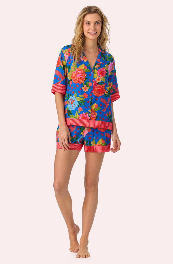 A lady wearing Georgia Short Woven Pj Set In Floral Fiesta