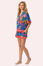 A lady wearing Georgia Short Woven Pj Set In Floral Fiesta
