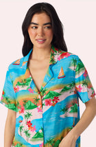 A Lady Wearing Amelia Short Woven Pj Set In Sunset Escape with a close up view