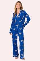 A lady wearing Collette Knit Pj Set In Cobalt Zebra