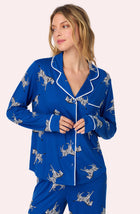 A lady wearing Collette Knit Pj Set In Cobalt Zebra