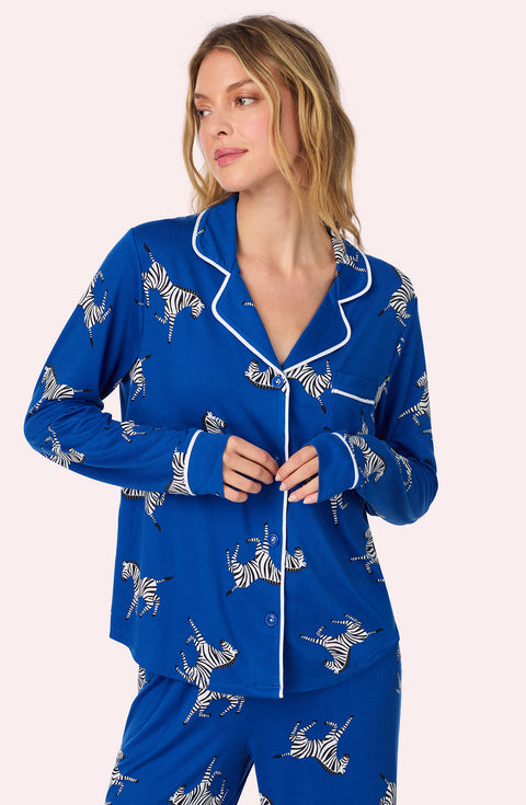 A lady wearing Collette Knit Pj Set In Cobalt Zebra