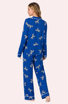 A lady wearing Collette Knit Pj Set In Cobalt Zebra
