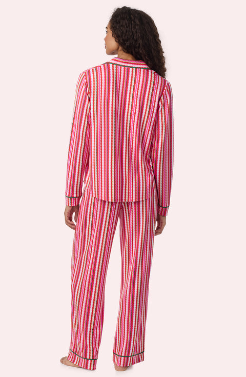A Lady Wearing Collette Knit Pj Set In Sugar Stripe in a back view pose