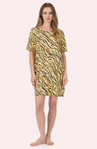 A Lady Wearing Sammi Knit Sleepshirt In Tiger Glam in a full view standing pose