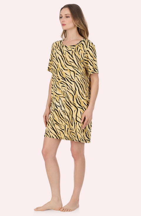 A Lady Wearing Sammi Knit Sleepshirt In Tiger Glam in a full view side angled pose