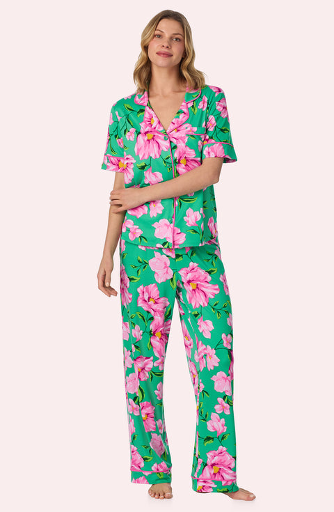A lady wearing Sienna Long Pj Set In Flora & Fern