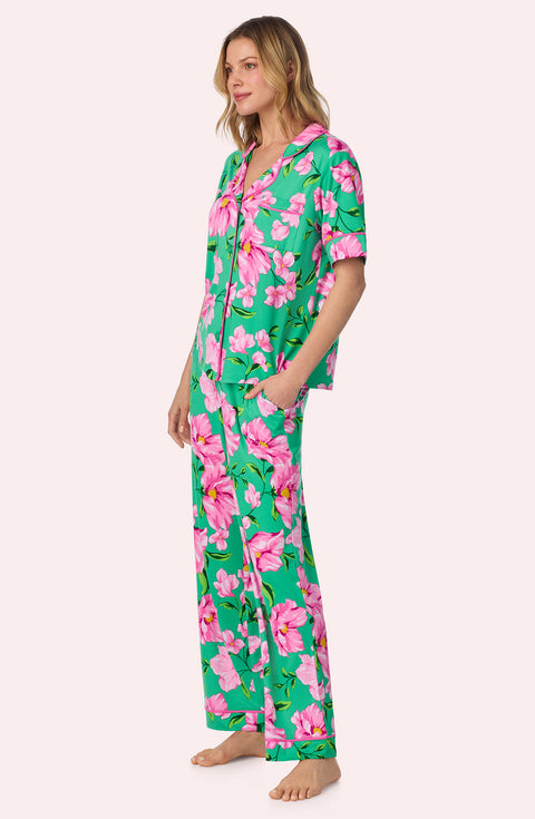 A lady wearing Sienna Long Pj Set In Flora & Fern