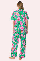 A lady wearing Sienna Long Pj Set In Flora & Fern