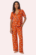 A lady wearing Arizona Long Knit Pj Set In Spooky Season