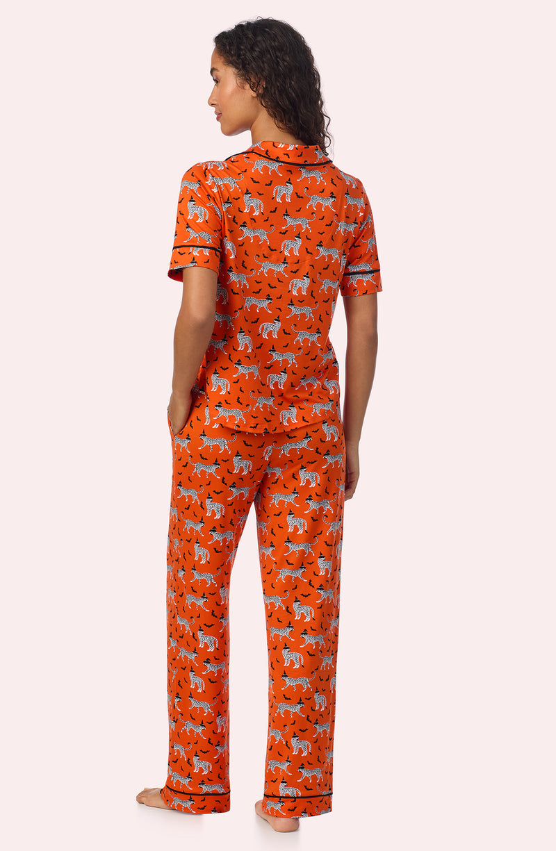 A lady wearing Arizona Long Knit Pj Set In Spooky Season