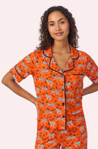 A lady wearing Arizona Long Knit Pj Set In Spooky Season