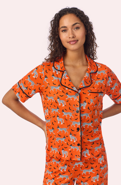 A lady wearing Arizona Long Knit Pj Set In Spooky Season