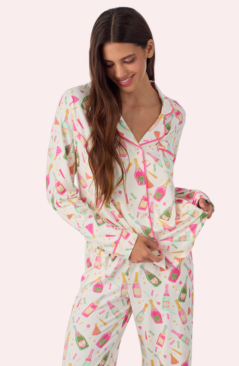 A lady wearing CHARLOTTE KNIT PJ SET IN FIZZ THE SEASON
