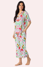 A Lady Wearing Dakota Cropped Knit Pj Set In Rainforest Escape posing a side angle view