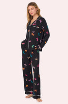A lady wearing Collette Knit Pj Set In Midnight Butterfly