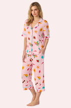 A Lady Wearing Dakota Cropped Knit Pj Set In Island Party posing side angle view