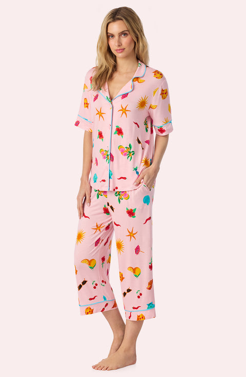 A Lady Wearing Dakota Cropped Knit Pj Set In Island Party posing side angle view
