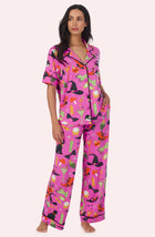 A Lady Wearing Sienna Long Knit Pj Set In Potion Commotion in a full view standing pose