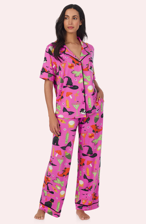 A Lady Wearing Sienna Long Knit Pj Set In Potion Commotion in a full view standing pose