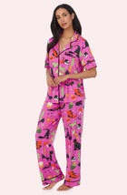 A Lady Wearing Sienna Long Knit Pj Set In Potion Commotion in a full standing view side angled pose