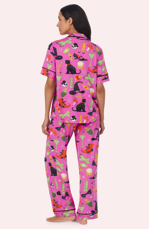 A Lady Wearing Sienna Long Knit Pj Set In Potion Commotion in a back view pose
