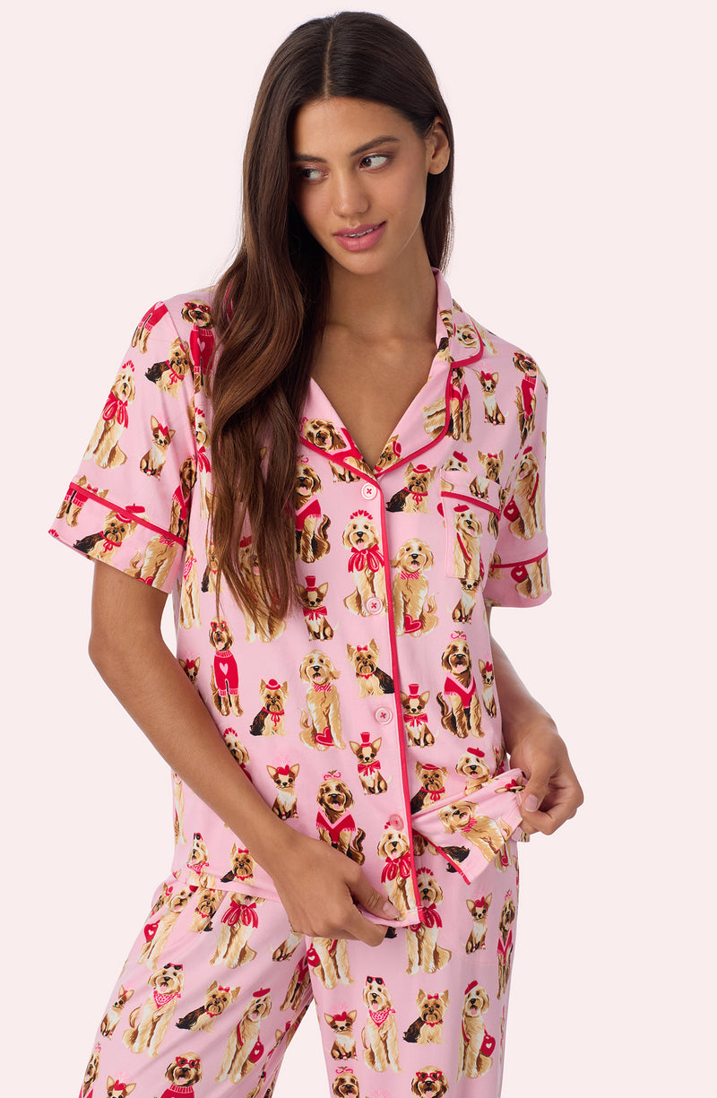 A lady wearing Arizona Long Knit Pj Set In Posh Pups