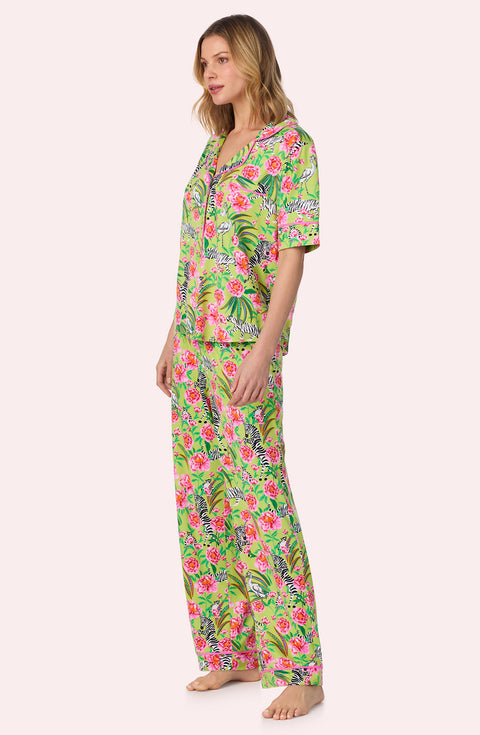 A lady wearing Sienna Long Knit Pj Set In Zebra Oasis Side view